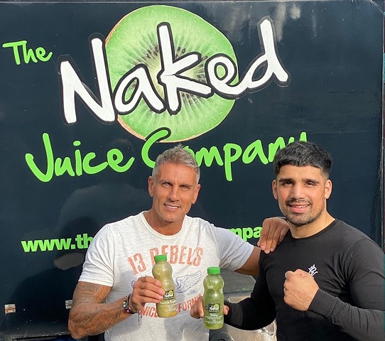 Wayne Redman from The Naked Juice Company with boxer Muhammad Ali
