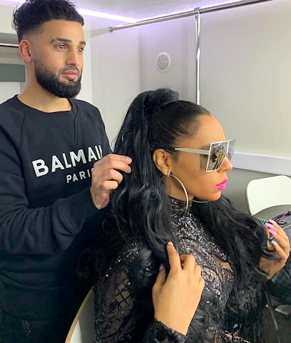 Mohammed Ilmaas styling hair for singer Ashanti before one of her UK concerts