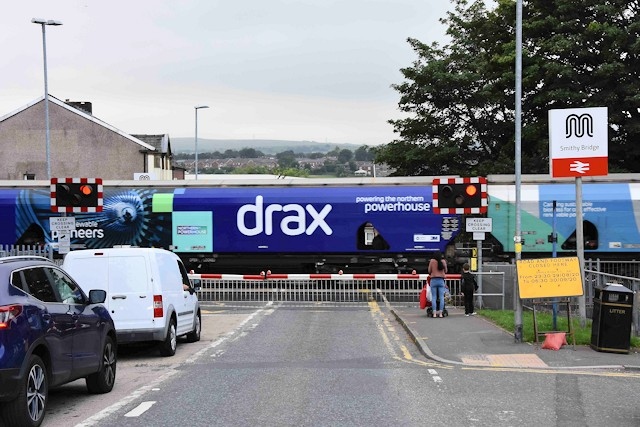 Drax goods train passing through Smithy Bridge station