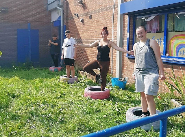NCS teams went to WHAG's private housing accommodation site and volunteered their time to various gardening and maintenance projects