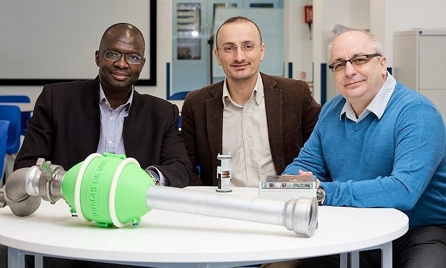 Bamidele Adebisi, Professor in Intelligent Infrastructure Systems, with, right, Paul Carrington, the CEO of Aquacheck Engineering and, centre, KTP associate Dario Chiantello with a prototype smart water meter developed via a Knowledge Transfer Partnership