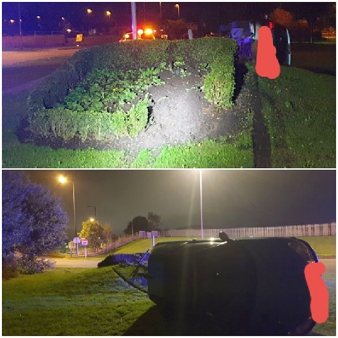 The Peugeot overturned in a flower bed