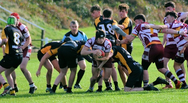 Olly Mills in the thick of the action