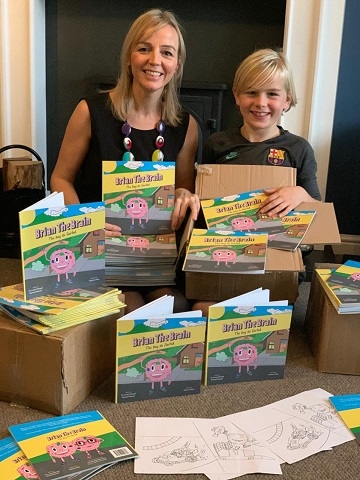 Dr Louise Mansell and son Samuel with their book, Brian the Brain
