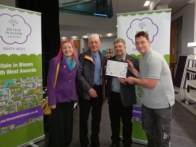 Volunteers from Petrus Incredible Edible Rochdale have been awarded the highest possible level in the ‘It’s Your Neighbourhood’ awards category as part of the North West In Bloom