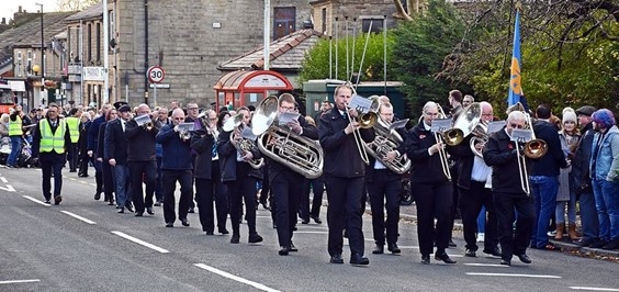 Whitworth Vale and Healey Band lead the Remembrance Sunday parade