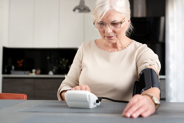Patients wrap the small machine around their upper arm to measure their blood pressure reading which they can then send to their GP to review
