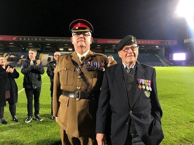 Jim Marland, 96, was presented with replacement medals after he had his stolen. Pictured with Major Phil Linehan