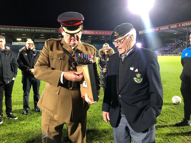 Jim Marland, 96, was presented with replacement medals after he had his stolen. Pictured with Major Phil Linehan