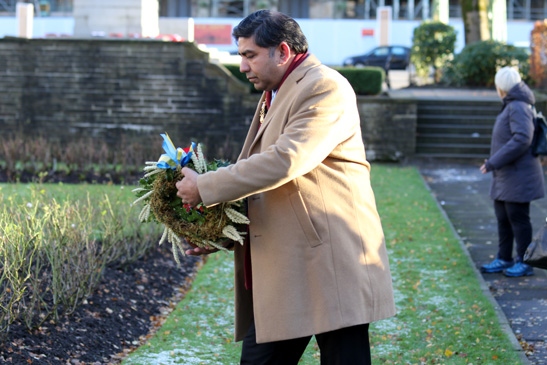 Mayor of Rochdale, Councillor Aasim Rashid lays a wreath at the Holodomor memorial stone