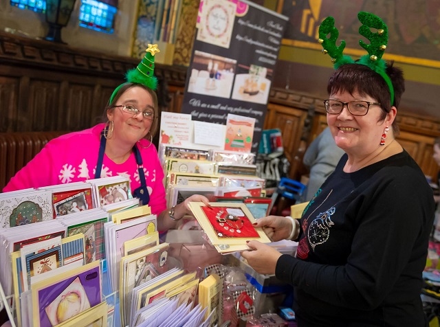 Around 30 small independent businesses offering a variety of products like jewellery, silk flowers, chocolate bouquets, wax melts and scents, sweets, wooden crafts, cards, beauty products and children’s clothing will be scattered throughout the shopping centre (pictured: Crafty Cards & Invites at a previous Christmas fair in Rochdale Town Hall)