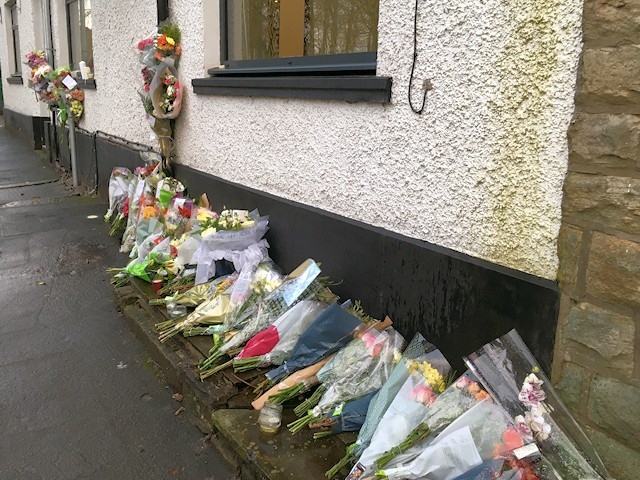Flowers at the scene of the collision