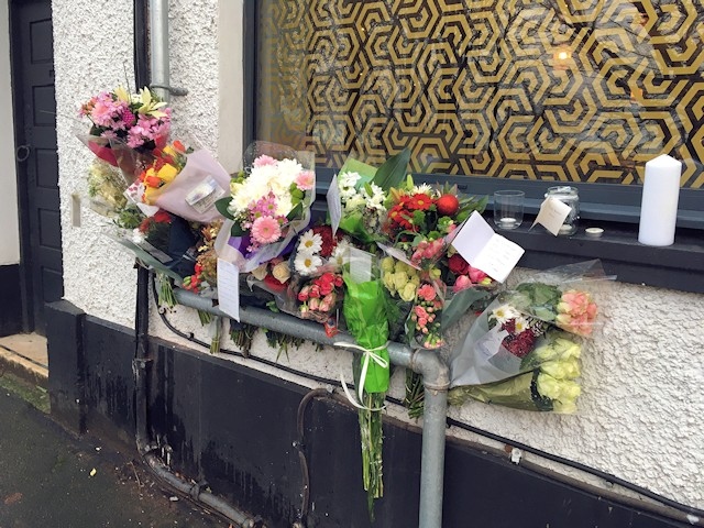 Flowers at the scene of the collision