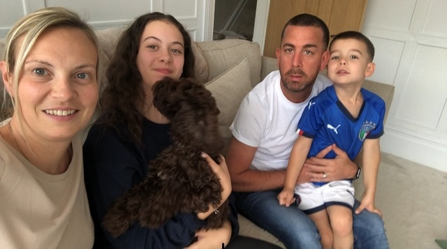 Tim Greenwood, based at Rochdale Police Station, will run 10 miles a day for 30 consecutive days throughout March (pictured with his family)