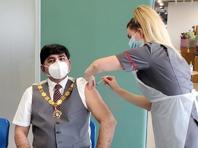 Deputy Mayor of Rochdale, Aasim Rashid getting his vaccination at Number One Riverside