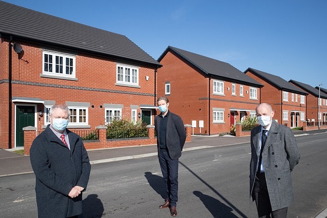 Rochdale Borough Councillor Neil Emmott with Russell Homes director Daniel Kershaw and Bob Pleasance from Onward Homes at Cedar Gardens in Heywood