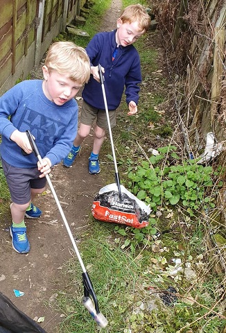 Douglas and Wilson with their litter pickers