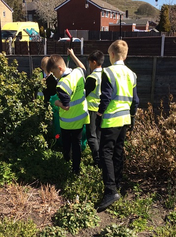Pupils in Years 4 and 6 took part in helping tidy up the village