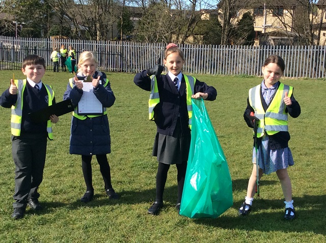 Pupils in Years 4 and 6 took part in helping tidy up the village