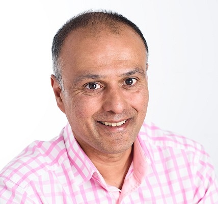 Raj Jain, the outgoing chief executive of the Northern Care Alliance NHS Group (pictured) will be succeeded by Dr Owen Williams OBE