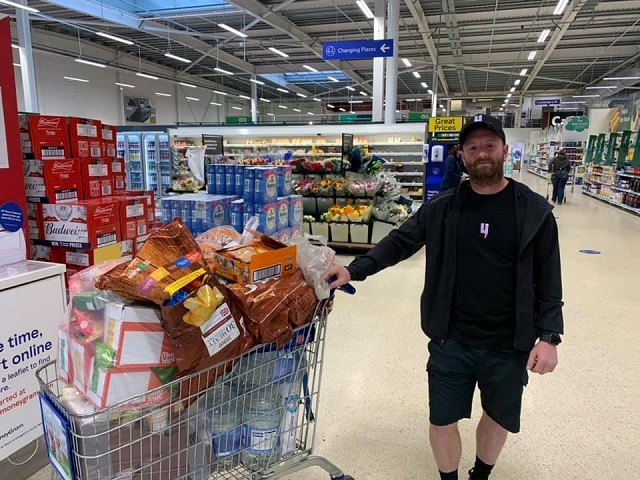 Danny Goodier, one of the group's founders, with the donations from Tesco Middleton