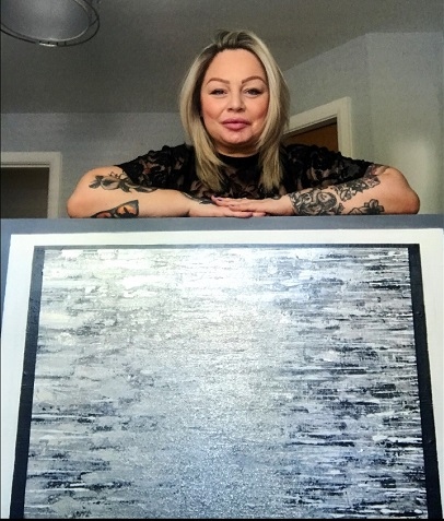 Dani Burke with her artwork
