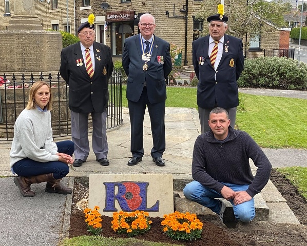 David Forbes (centre back), President of the Royal British Legion Rochdale, with Peter Clegg of Rochdale & District Fusiliers (left back) and Harry Bell (right back), artist Gill Rothwell (front left) and Rochdale In Bloom vice chairman Paul Ellison (front right)