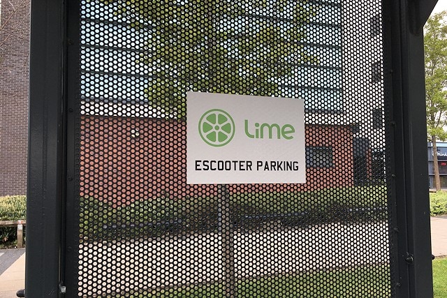 Lime E-scooters parking sign