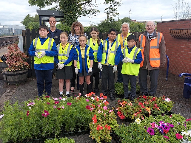 Dawn Frost and Anne Marie Kent accompanied St Edward's pupils, pictured with Richard Hagan of Crystal Doors and Councillor Billy Sheerin