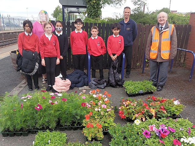 Headteacher Lindsay Torrance supervised Castleton Community Primary pupils, pictured with Richard Hagan of Crystal Doors and Councillor Billy Sheerin