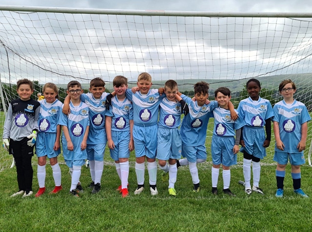 First team from Milnrow Dynamos FC - the Under 11 Falcons