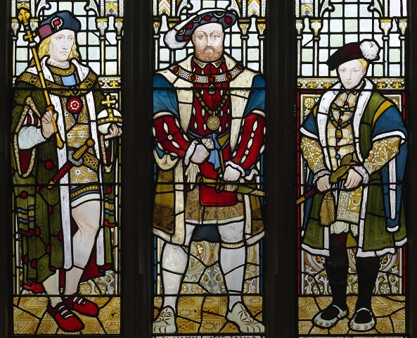 Some of the town hall stained glass windows, some of which feature famous past monarchs like Henry VIII