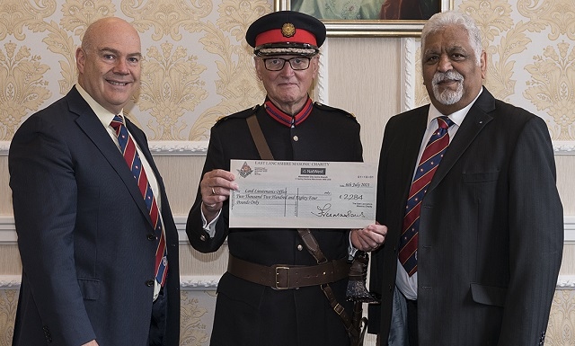 Pictured from left to right: John Taylor, District Charity Steward; Ian Sandiford, Deputy Lieutenant for Rochdale; Douglas Smith, Rochdale District Chairman