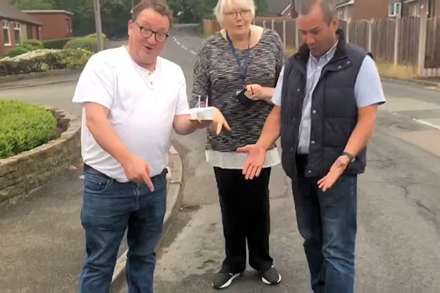 Councillors Andy Kelly, Irene Davidson and Dave Bamford sang 'happy birthday' to the pothole