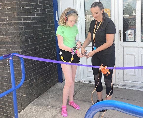 Ambassador for All Aboard CIC, Scarlett King and Director, Beth Kitchen cut the ribbon to officially open the centre