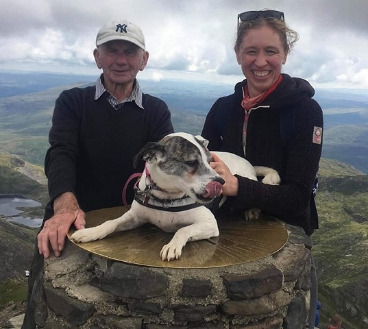 Gordon Aaron at the summit of Snowdon with Sarah Shard and dog Molly
