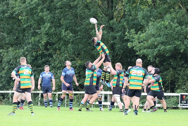 Littleborough RUFC (in green and gold) play against Aspull in 2021 (file photo)