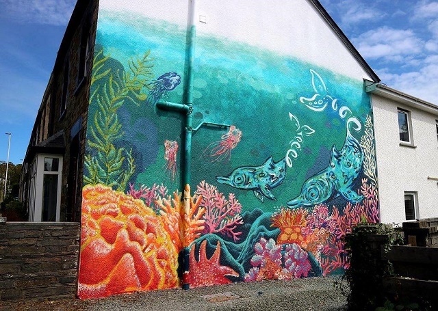 UK Youth for Nature’s Natural Kingdom: Wild Walls project, a mural of bottlenose dolphins in Aberystwyth