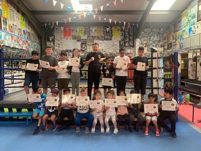Each child received a certificate at Hamer Boxing Club