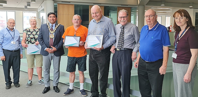 Mayor of Rochdale Councillor Aasim Rashid - Presented certificates to volunteers who cleaned up Rochdale Train Station