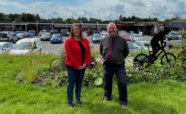 The council will continue to maintain the parking spaces, which are well used by shoppers and people attending nearby community facilities (pictured: Councillors Rachel Massey and Neil Emmott)