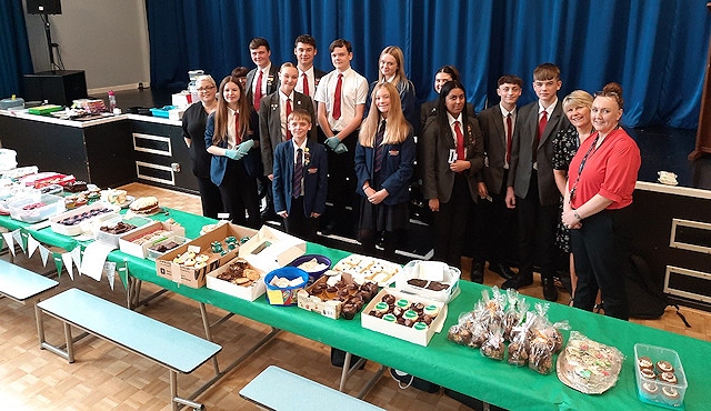Students get ready to serve cakes at the Whitworth Community High School Macmillan Coffee Morning
