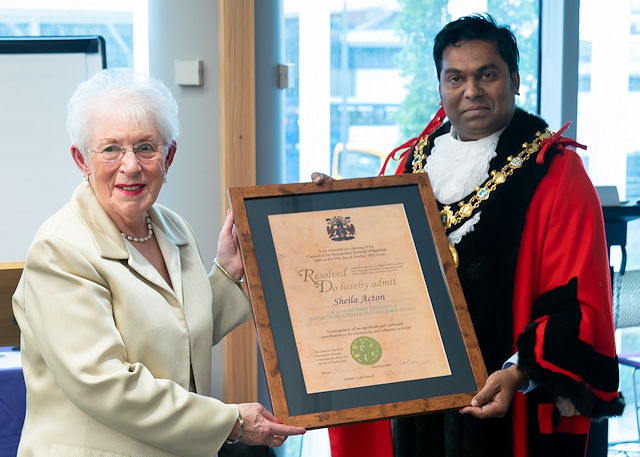Sheila Acton was presented with her award by the mayor councillor Ali Ahmed