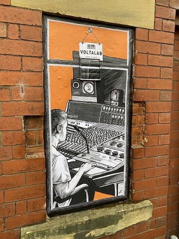 The paste-up mural at Voltalab