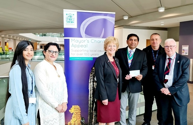 The Rochdale Veterans' Breakfast Club received a cheque from Councillor Aasim Rashid