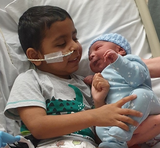 The heartbreaking bittersweet moment Saqib met his baby brother Atif just hours after he was born on 21 September 2021. Thirteen days later Saqib died.