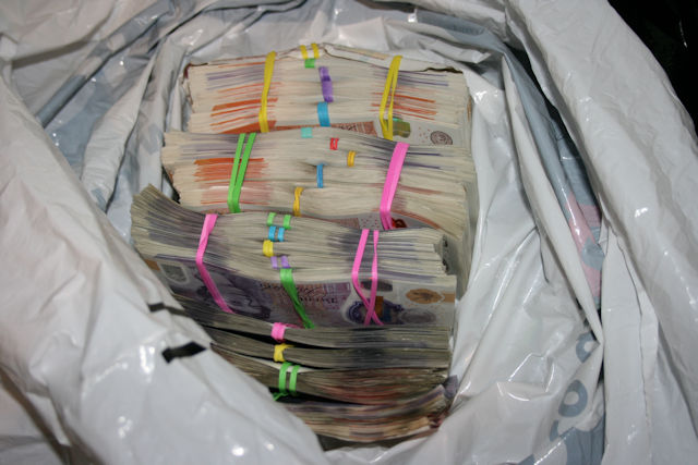 Police seized seized approximately £30,000 in cash