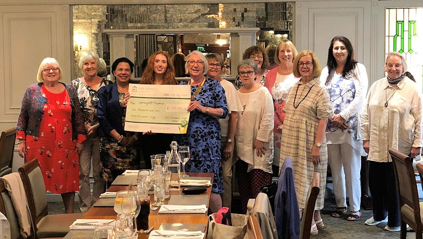 Inner Wheel members presenting the cheque to Jenna from the hospice