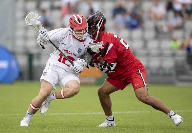 England battled to the last second in the final pool stage of the 2022 World Lacrosse Men's U21 World Championships, losing 13-1 to Canada in rainy Limerick