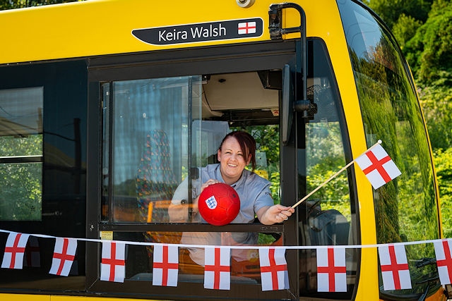 Rosso bus driver Vicky Worrall with the specially named bus in honour of England’s European Championship-winning Lioness Keira Walsh, who was born and grew up in Rochdale